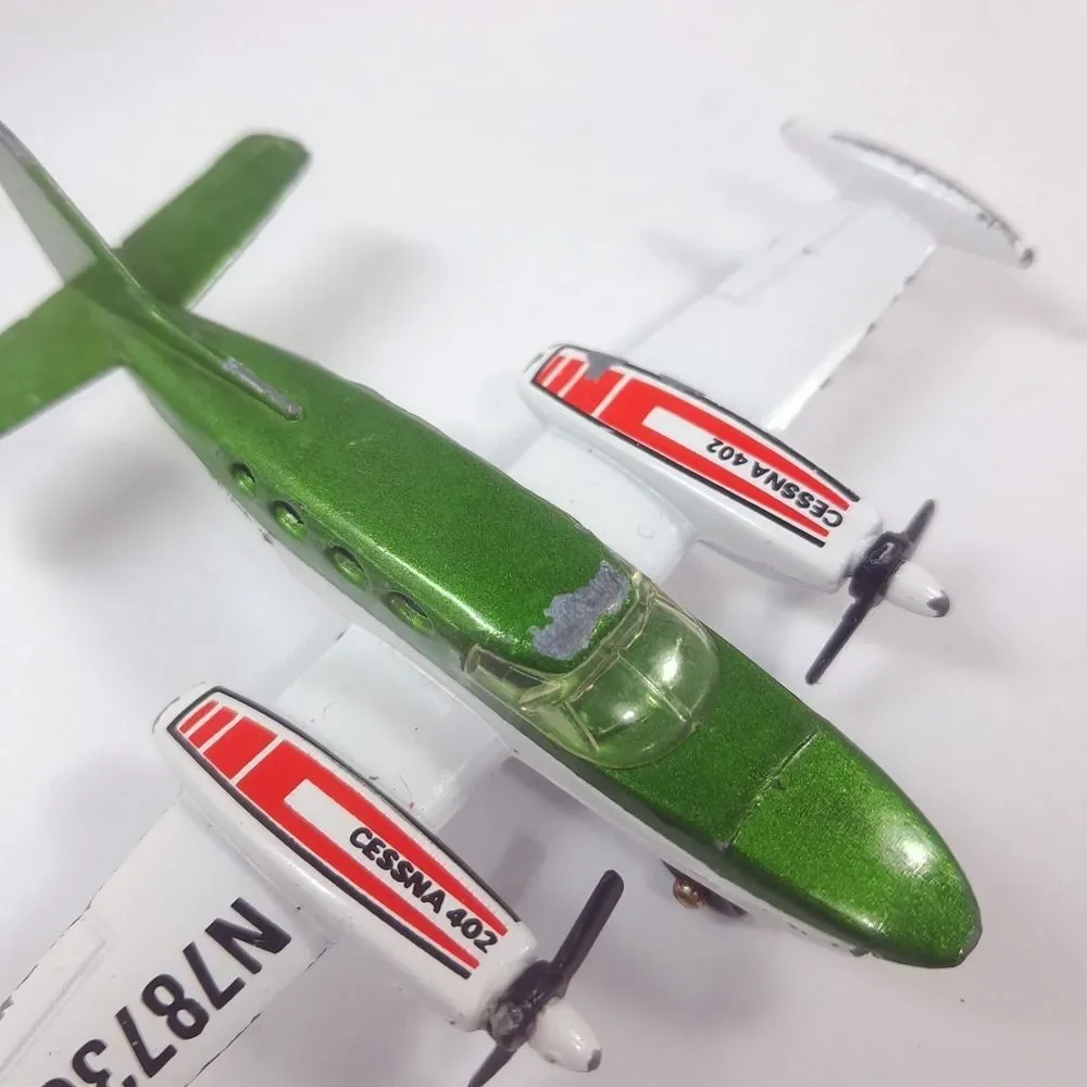 MATCHBOX Sky Busters 1974 SP9 Cessna 402 plane Airplane Macau Diecast green